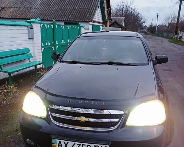 Черный Шевроле Лачетти, объемом двигателя 1.8 л и пробегом 241 тыс. км за 4300 $, фото 12 на Automoto.ua