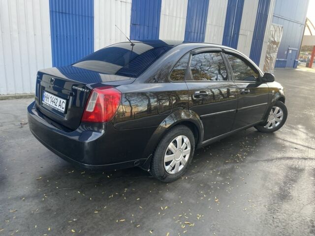 Черный Шевроле Лачетти, объемом двигателя 1.8 л и пробегом 298 тыс. км за 4200 $, фото 3 на Automoto.ua