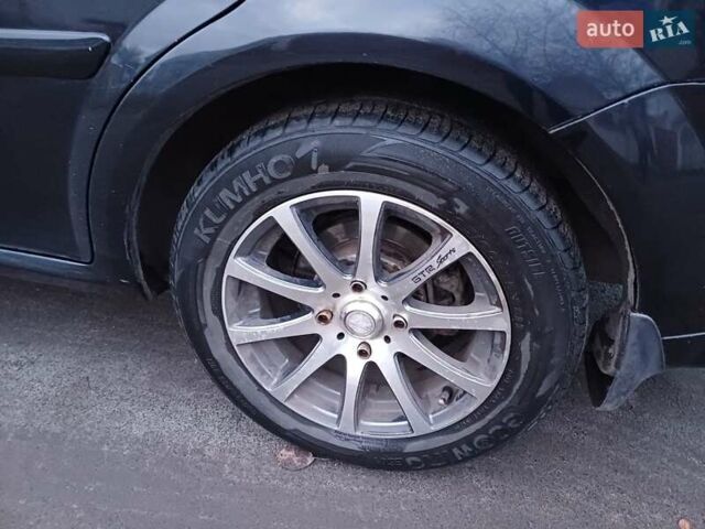 Черный Шевроле Лачетти, объемом двигателя 1.8 л и пробегом 241 тыс. км за 4300 $, фото 9 на Automoto.ua