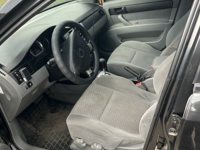 Черный Шевроле Лачетти, объемом двигателя 1.8 л и пробегом 266 тыс. км за 4500 $, фото 3 на Automoto.ua