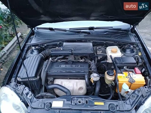 Черный Шевроле Лачетти, объемом двигателя 1.8 л и пробегом 241 тыс. км за 4300 $, фото 6 на Automoto.ua