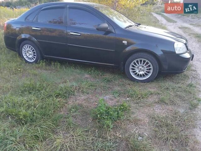 Черный Шевроле Лачетти, объемом двигателя 1.6 л и пробегом 240 тыс. км за 3800 $, фото 4 на Automoto.ua
