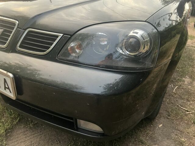 Черный Шевроле Лачетти, объемом двигателя 1.8 л и пробегом 266 тыс. км за 4500 $, фото 7 на Automoto.ua