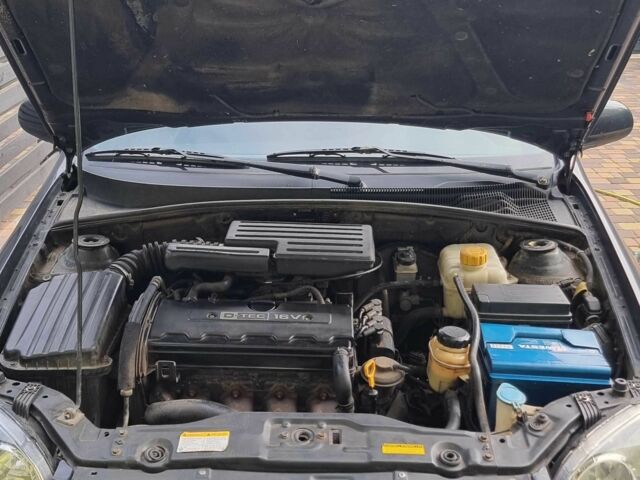 Черный Шевроле Лачетти, объемом двигателя 1.8 л и пробегом 168 тыс. км за 3000 $, фото 18 на Automoto.ua