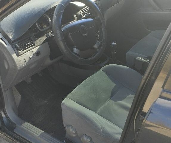 Черный Шевроле Лачетти, объемом двигателя 1.8 л и пробегом 362 тыс. км за 4209 $, фото 2 на Automoto.ua