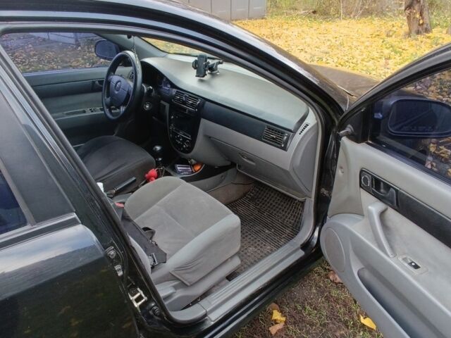 Черный Шевроле Лачетти, объемом двигателя 1.6 л и пробегом 259 тыс. км за 3500 $, фото 12 на Automoto.ua