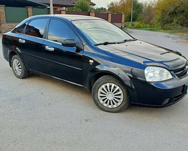 Черный Шевроле Лачетти, объемом двигателя 1.8 л и пробегом 150 тыс. км за 3200 $, фото 6 на Automoto.ua