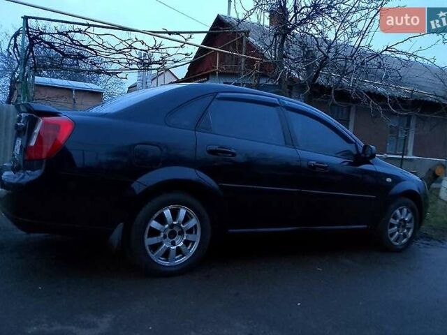 Черный Шевроле Лачетти, объемом двигателя 1.6 л и пробегом 195 тыс. км за 3350 $, фото 7 на Automoto.ua