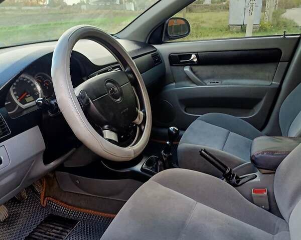 Черный Шевроле Лачетти, объемом двигателя 1.8 л и пробегом 150 тыс. км за 3200 $, фото 15 на Automoto.ua