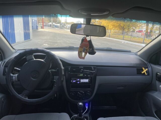 Черный Шевроле Лачетти, объемом двигателя 1.8 л и пробегом 298 тыс. км за 4200 $, фото 7 на Automoto.ua