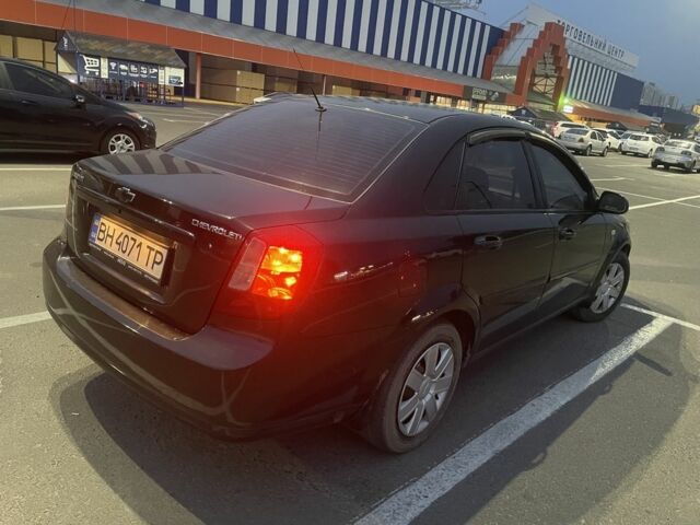 Черный Шевроле Лачетти, объемом двигателя 1.8 л и пробегом 280 тыс. км за 4200 $, фото 4 на Automoto.ua