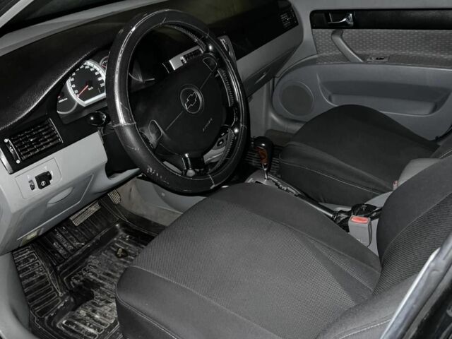 Черный Шевроле Лачетти, объемом двигателя 1.8 л и пробегом 260 тыс. км за 1699 $, фото 3 на Automoto.ua