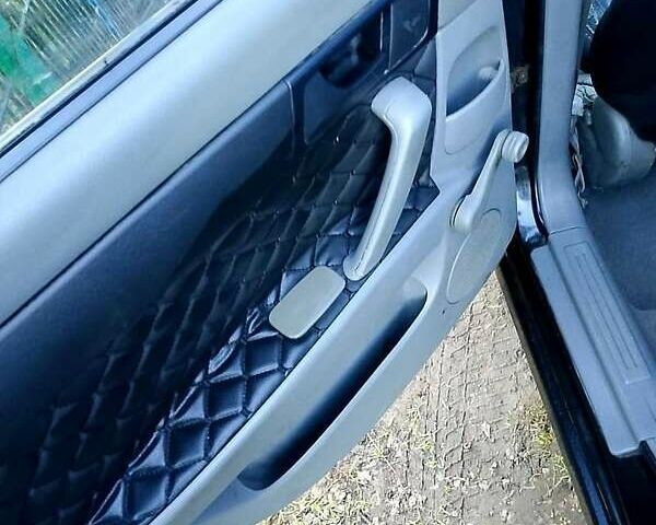 Черный Шевроле Лачетти, объемом двигателя 1.6 л и пробегом 195 тыс. км за 3350 $, фото 4 на Automoto.ua