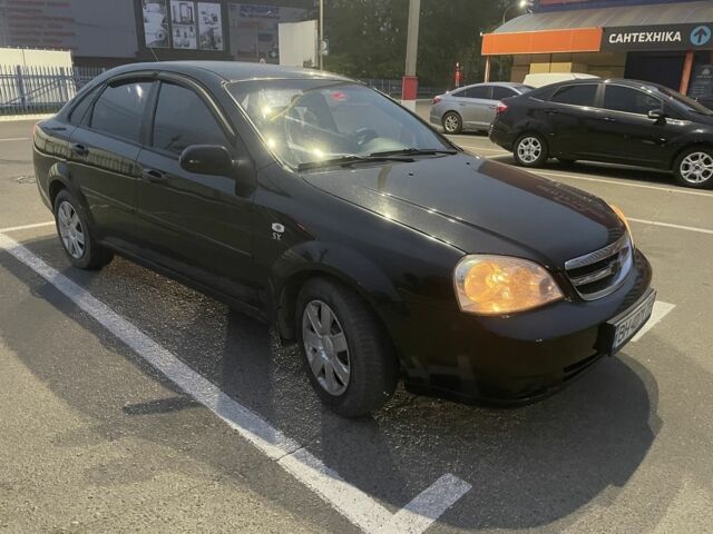 Черный Шевроле Лачетти, объемом двигателя 1.8 л и пробегом 280 тыс. км за 4200 $, фото 5 на Automoto.ua