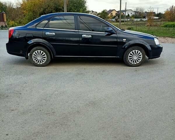 Черный Шевроле Лачетти, объемом двигателя 1.8 л и пробегом 150 тыс. км за 3200 $, фото 4 на Automoto.ua