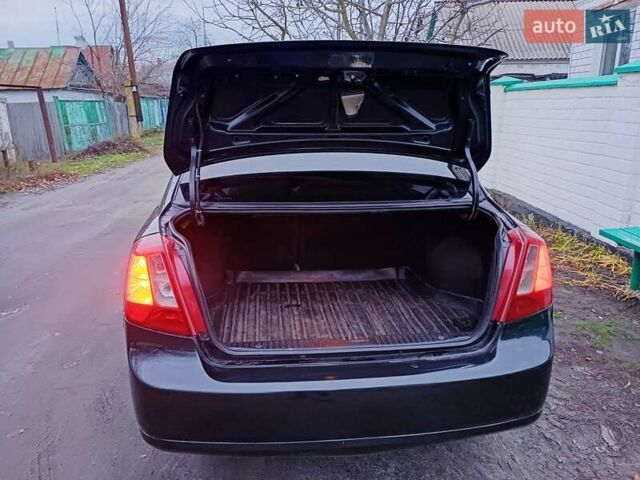 Черный Шевроле Лачетти, объемом двигателя 1.8 л и пробегом 241 тыс. км за 4300 $, фото 5 на Automoto.ua