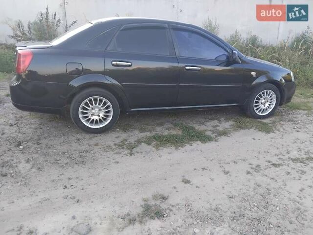 Черный Шевроле Лачетти, объемом двигателя 1.6 л и пробегом 240 тыс. км за 3800 $, фото 2 на Automoto.ua
