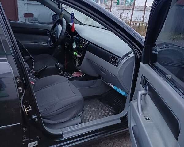 Черный Шевроле Лачетти, объемом двигателя 1.8 л и пробегом 241 тыс. км за 4300 $, фото 7 на Automoto.ua