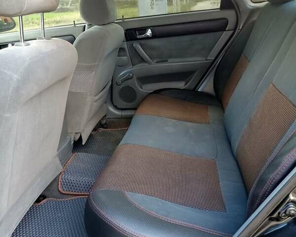 Черный Шевроле Лачетти, объемом двигателя 1.8 л и пробегом 150 тыс. км за 3200 $, фото 12 на Automoto.ua