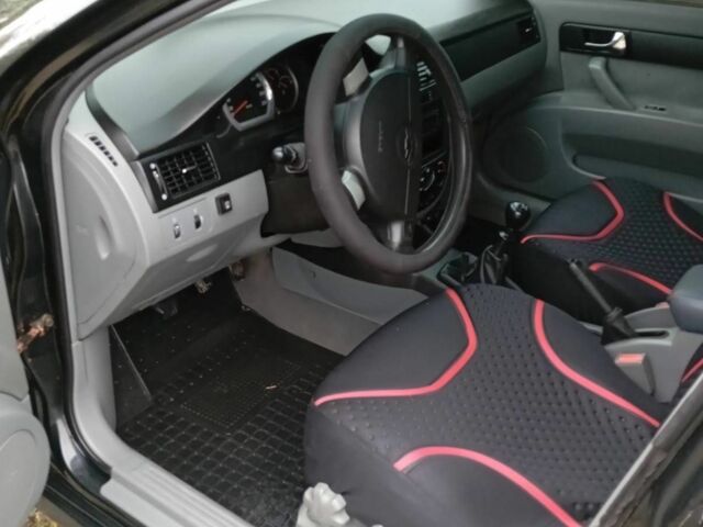 Чорний Шевроле Лачетті, об'ємом двигуна 1.8 л та пробігом 185 тис. км за 3900 $, фото 7 на Automoto.ua