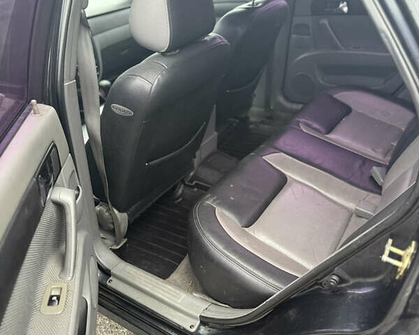 Черный Шевроле Лачетти, объемом двигателя 1.8 л и пробегом 230 тыс. км за 3200 $, фото 6 на Automoto.ua