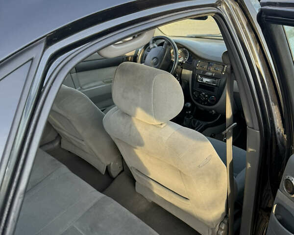 Черный Шевроле Лачетти, объемом двигателя 1.6 л и пробегом 180 тыс. км за 2200 $, фото 1 на Automoto.ua