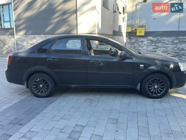 Черный Шевроле Лачетти, объемом двигателя 1.8 л и пробегом 228 тыс. км за 3000 $, фото 4 на Automoto.ua