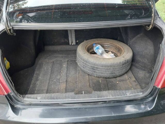 Черный Шевроле Лачетти, объемом двигателя 1.6 л и пробегом 360 тыс. км за 3200 $, фото 7 на Automoto.ua