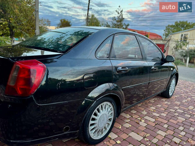 Чорний Шевроле Лачетті, об'ємом двигуна 1.6 л та пробігом 185 тис. км за 2800 $, фото 11 на Automoto.ua