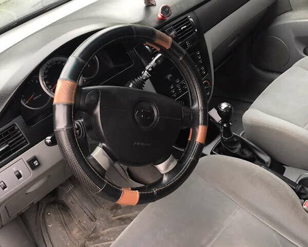 Чорний Шевроле Лачетті, об'ємом двигуна 1.8 л та пробігом 233 тис. км за 4100 $, фото 7 на Automoto.ua