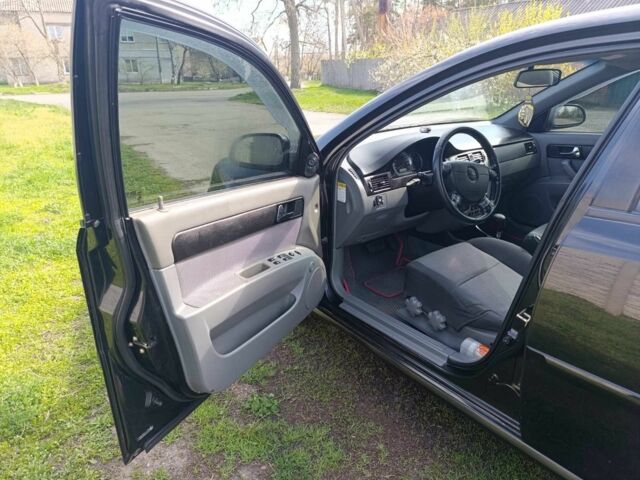 Черный Шевроле Лачетти, объемом двигателя 1.8 л и пробегом 241 тыс. км за 4500 $, фото 4 на Automoto.ua