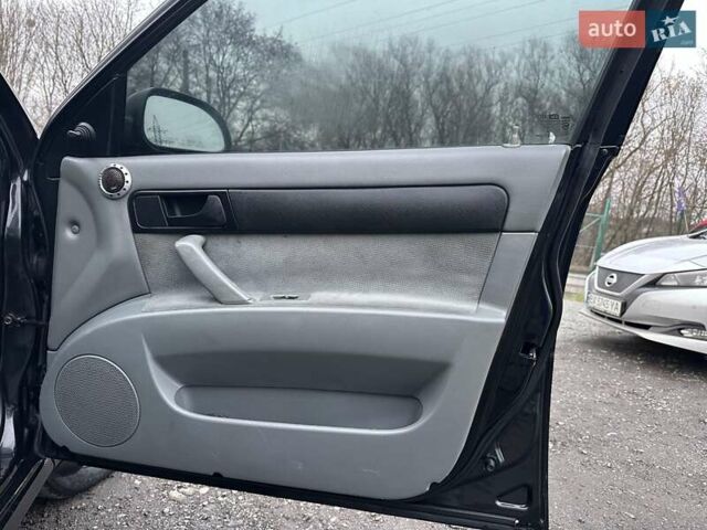 Черный Шевроле Лачетти, объемом двигателя 1.6 л и пробегом 280 тыс. км за 2999 $, фото 44 на Automoto.ua