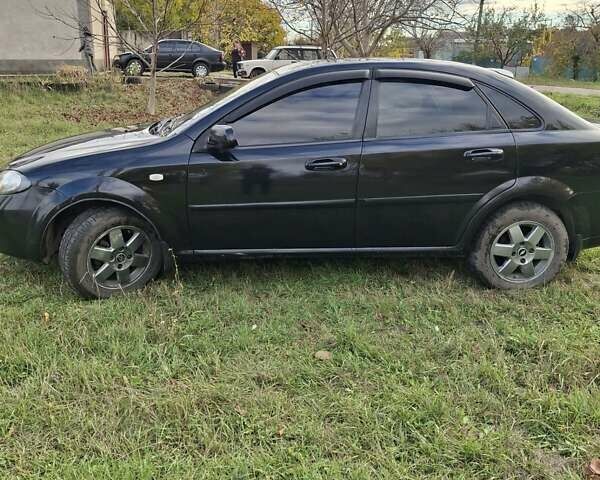 Черный Шевроле Лачетти, объемом двигателя 1.8 л и пробегом 360 тыс. км за 3300 $, фото 8 на Automoto.ua