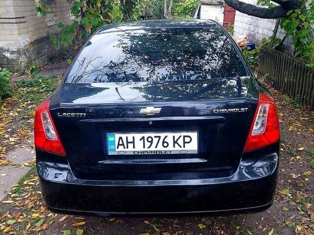Черный Шевроле Лачетти, объемом двигателя 1.8 л и пробегом 203 тыс. км за 3800 $, фото 1 на Automoto.ua