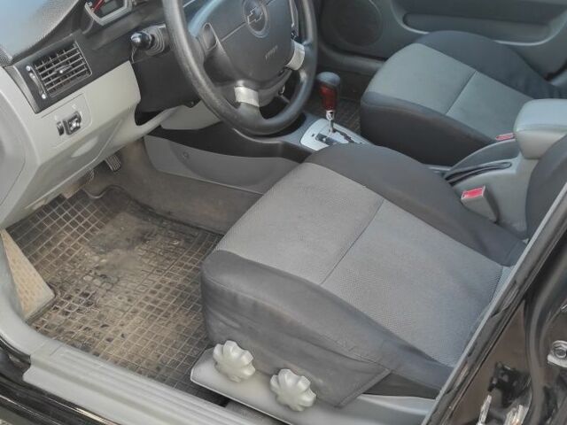 Черный Шевроле Лачетти, объемом двигателя 1.8 л и пробегом 300 тыс. км за 2850 $, фото 8 на Automoto.ua