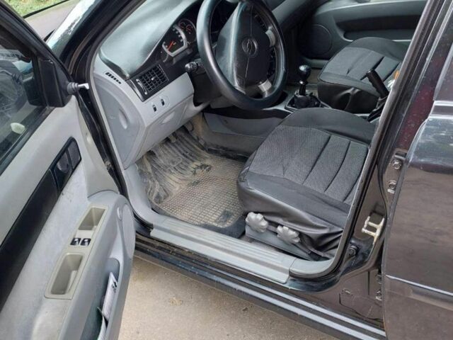 Черный Шевроле Лачетти, объемом двигателя 1.6 л и пробегом 360 тыс. км за 3200 $, фото 4 на Automoto.ua