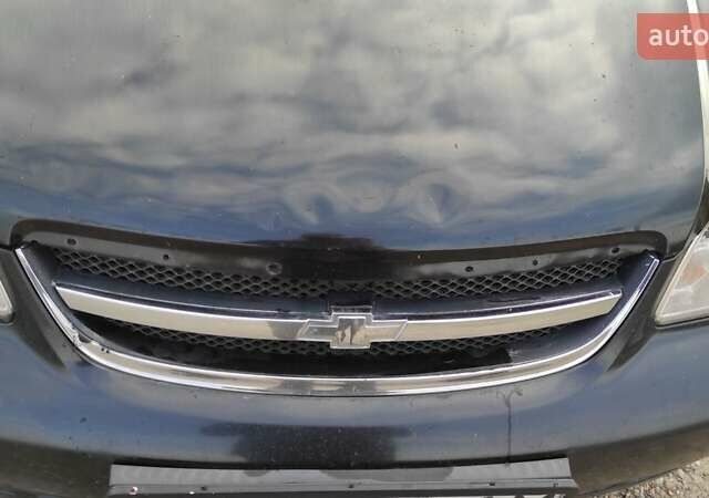 Черный Шевроле Лачетти, объемом двигателя 1.8 л и пробегом 390 тыс. км за 3100 $, фото 19 на Automoto.ua