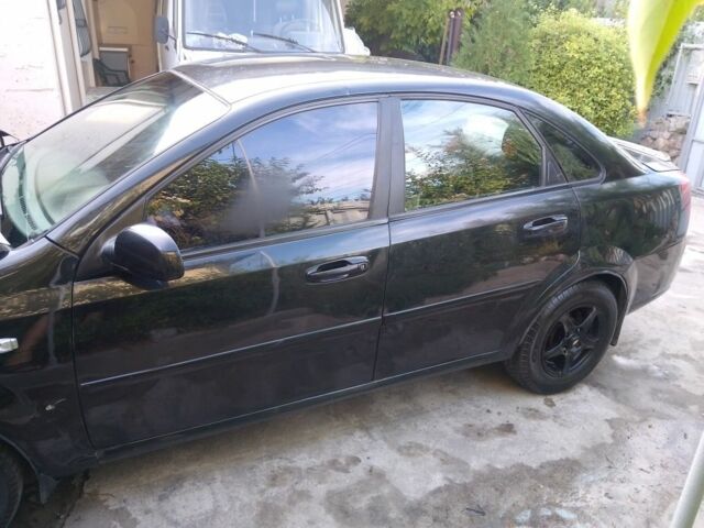 Черный Шевроле Лачетти, объемом двигателя 1.8 л и пробегом 307 тыс. км за 2700 $, фото 18 на Automoto.ua