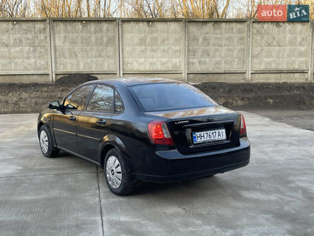 Черный Шевроле Лачетти, объемом двигателя 1.8 л и пробегом 180 тыс. км за 2850 $, фото 2 на Automoto.ua