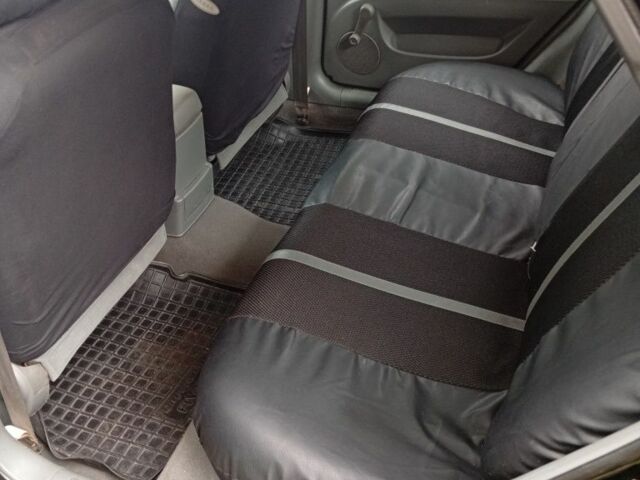 Черный Шевроле Лачетти, объемом двигателя 1.8 л и пробегом 256 тыс. км за 4500 $, фото 7 на Automoto.ua