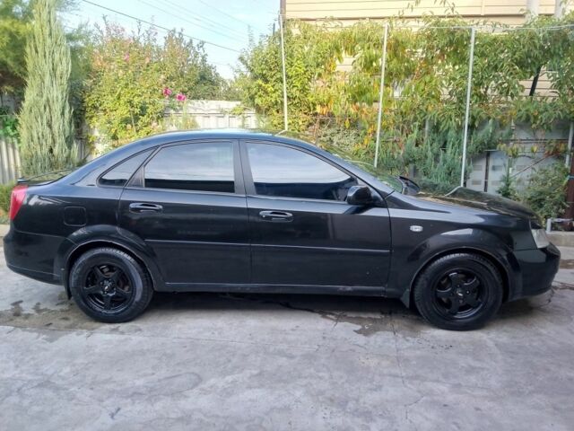 Черный Шевроле Лачетти, объемом двигателя 1.8 л и пробегом 307 тыс. км за 2700 $, фото 2 на Automoto.ua