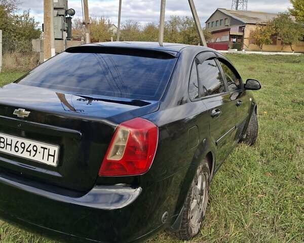 Черный Шевроле Лачетти, объемом двигателя 1.8 л и пробегом 360 тыс. км за 3300 $, фото 3 на Automoto.ua