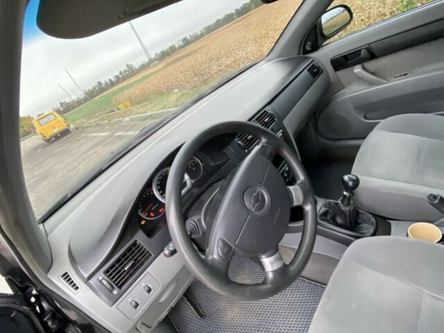 Черный Шевроле Лачетти, объемом двигателя 1.6 л и пробегом 170 тыс. км за 3800 $, фото 7 на Automoto.ua