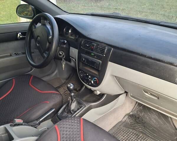 Черный Шевроле Лачетти, объемом двигателя 1.8 л и пробегом 360 тыс. км за 3300 $, фото 2 на Automoto.ua