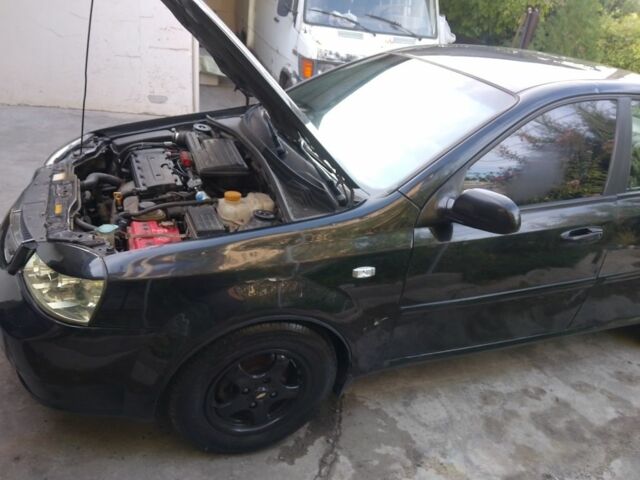 Черный Шевроле Лачетти, объемом двигателя 1.8 л и пробегом 307 тыс. км за 2700 $, фото 19 на Automoto.ua