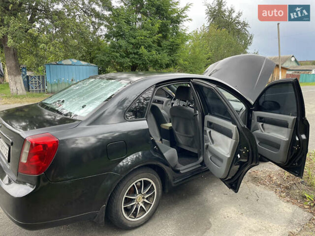 Чорний Шевроле Лачетті, об'ємом двигуна 1.6 л та пробігом 248 тис. км за 3333 $, фото 9 на Automoto.ua