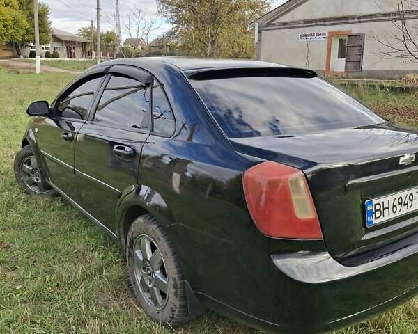 Черный Шевроле Лачетти, объемом двигателя 1.8 л и пробегом 360 тыс. км за 3300 $, фото 4 на Automoto.ua