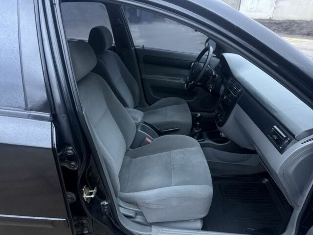 Черный Шевроле Лачетти, объемом двигателя 1.8 л и пробегом 220 тыс. км за 2950 $, фото 9 на Automoto.ua