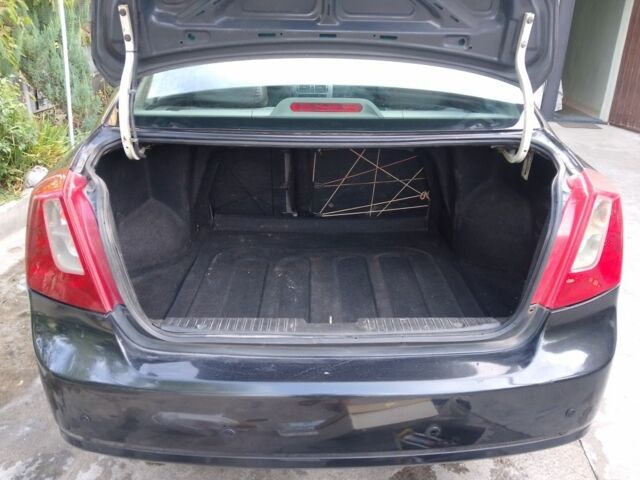 Черный Шевроле Лачетти, объемом двигателя 1.8 л и пробегом 307 тыс. км за 2700 $, фото 11 на Automoto.ua