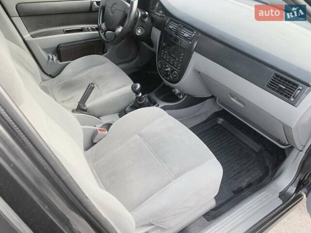 Чорний Шевроле Лачетті, об'ємом двигуна 1.6 л та пробігом 225 тис. км за 3900 $, фото 13 на Automoto.ua